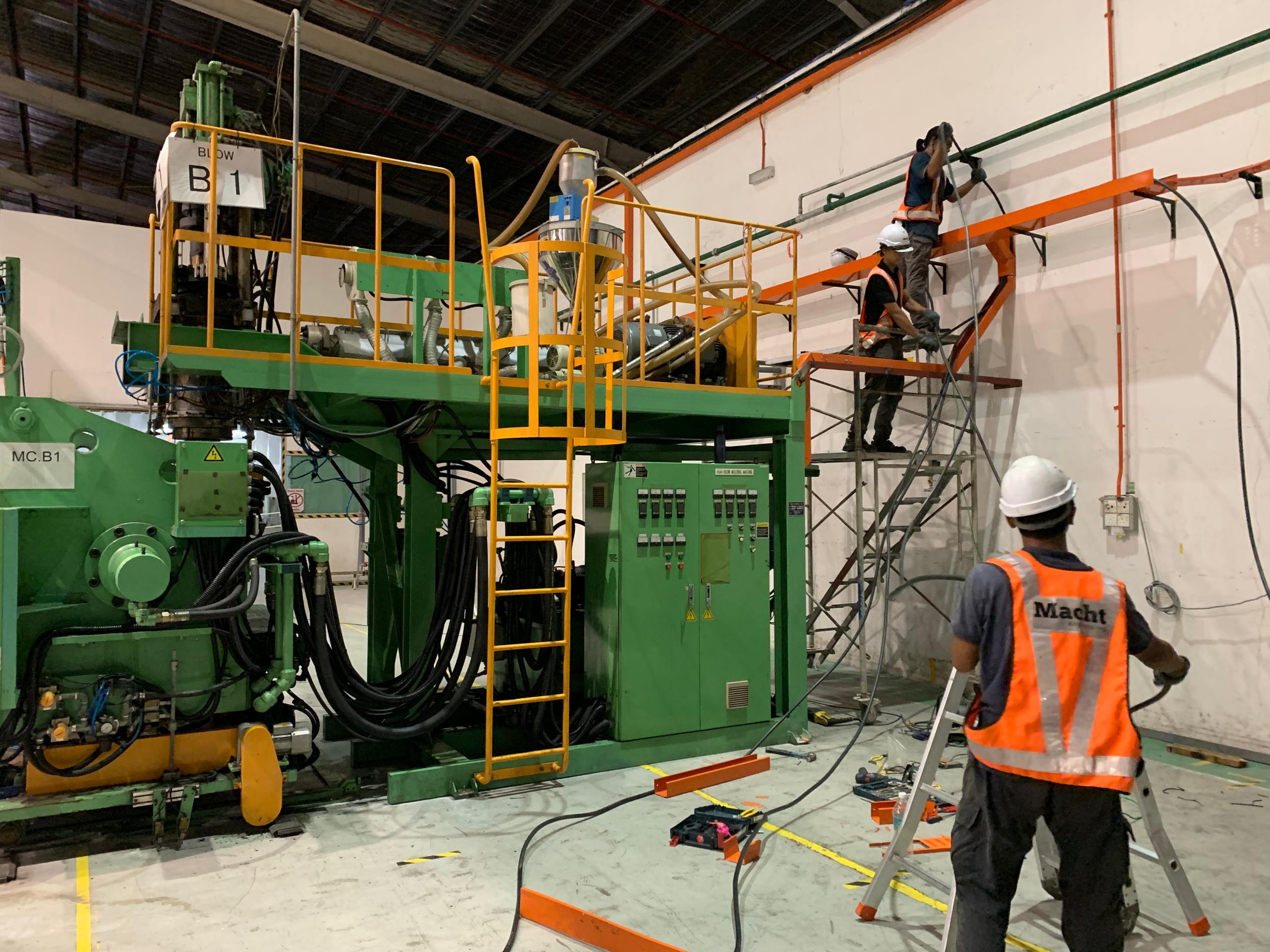 Macht Engineering team reviewing an industrial project on site